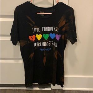 Love conquers all tee